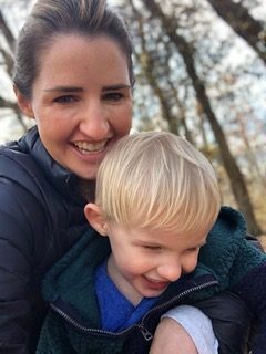 Mom and son outside in an embrace