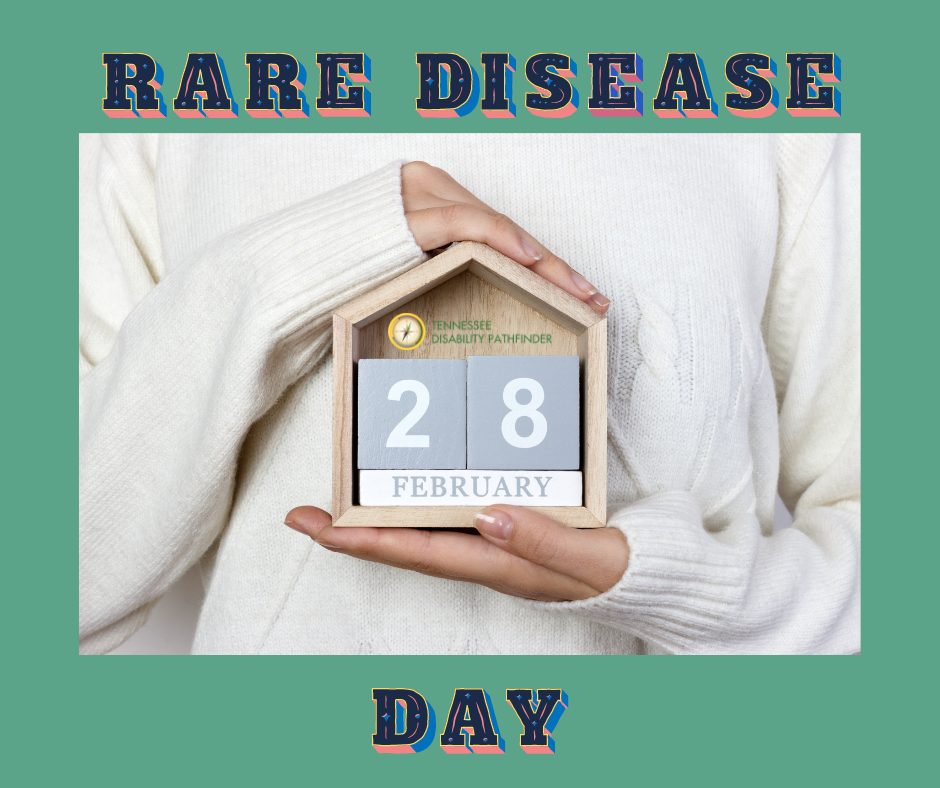 Torso of a person with hands in front holding a small house with a calendar dated text "28 February" inside. Image is on a light green background with text "Rare Disease Day." Pathfinder branded graphic is inside top part of house above the numbers.