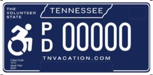 Image of blue license plate with Tennessee at the top of plate a graphic of a person in a wheelchair with PD 00000 to the right of the graphic. "TNVACATION.COM," is at the bottom of the image.