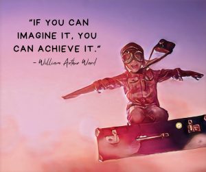 Purple and pink background. There is a photo of a young kid wearing a brown pilot hat and goggles; he is sitting on his knees on a suitcase, and his arms are spread to his sides as if flying in the sky. The text to the left of the photo says, "IF YOU CAN IMAGINE IT, YOU CAN ACHIEVE IT." The Pathfinder compass is at the top right corner of the suitcase.