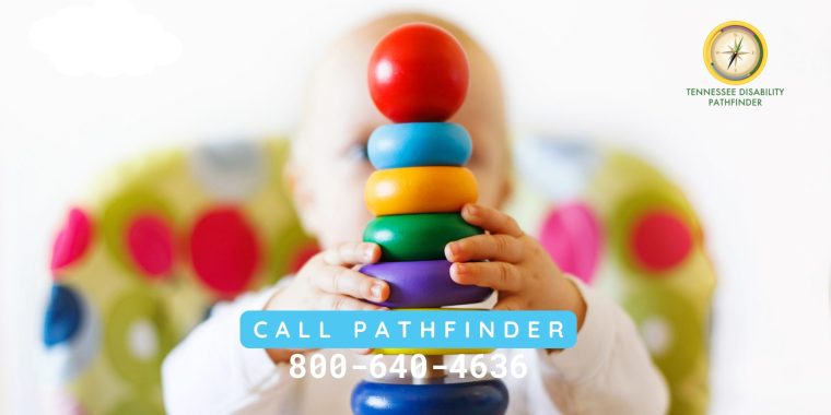 Blurred background of a photograph of a baby holding a rainbow stacker wooden ring toy. Text at the front of the photograph reads, "CALL PATHFINDER 800-640-4636". Pathfinder's branded graphic is at the top right corner of the image.