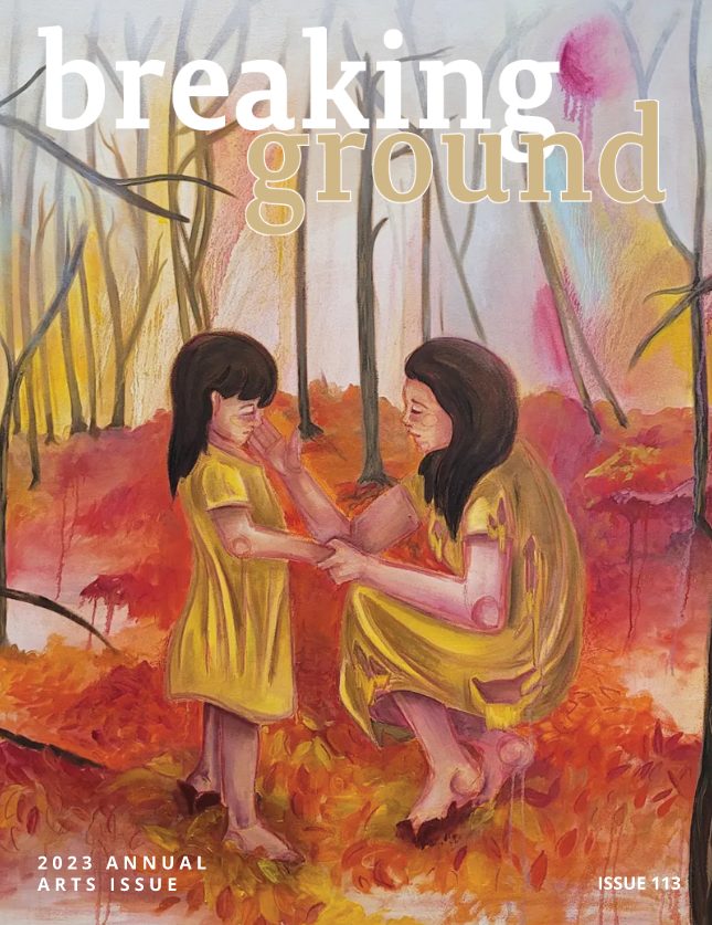 Magazine cover art image. Text on the cover says “Breaking Ground issue. Cover is an image of a little girl with brown hair and a yellow dress stands barefoot in a forest, looking a little sad or scared, while a brown-haired adult woman in a matching yellow dress crouches down to comfort the girl. She is also barefoot and is holding one of the girl’s hands and touching the girl’s face with her other hand. They are standing in a forest setting of red, yellow and orange leaves on the ground and bare trees in the background.