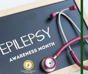 Image of a chalk board with a tan wood border. Text on the left of the board, "EPILEPSY AWARENESS MONTH." On the right of the board is a red and silver stethascope. Patfhinder's branded graphic is on the bottom left of the board.
