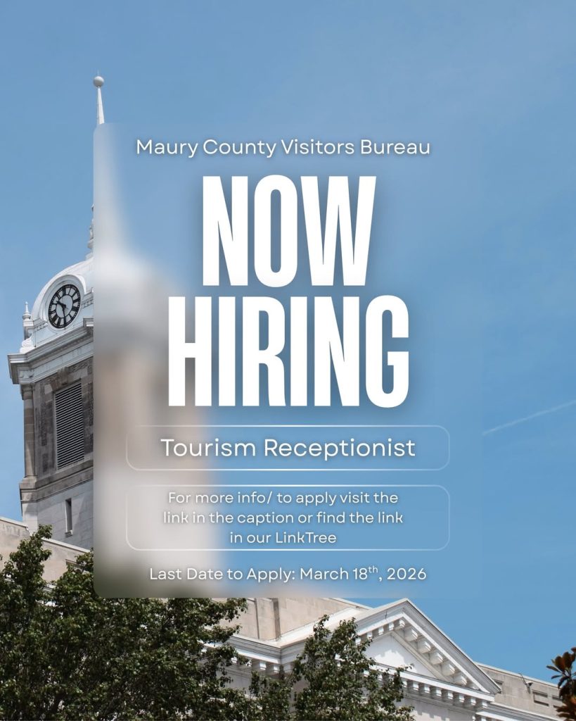 mage announcing a Tourism Receptionist position for the Maury County Visitors Bureau. The graphic displays a courthouse‑style building with a clock tower against a blue sky. Overlaid text reads “Now Hiring” with the job title, application instructions directing users to the LinkTree, and the application deadline of March 18, 2026.